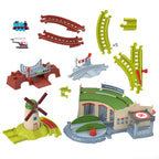THOMAS & FRIENDS bėgių trasos rinkinys su lokomotyvų depu (JLL36)