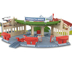 THOMAS & FRIENDS bėgių trasos rinkinys su lokomotyvų depu (JLL36)