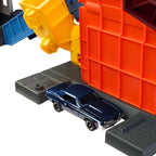 MATCHBOX MOVIE Smalley’s automobilių traiškymo garažas su trasa (JMG56)