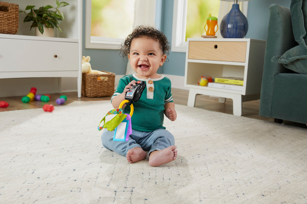 FISHER-PRICE LAUGH AND LEARN žaisliniai automobilio rakteliai (HVH43)