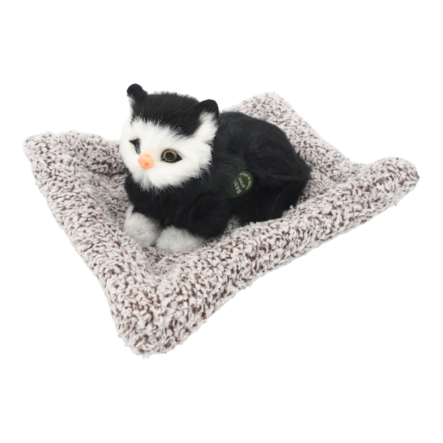 Mielai murkianti žaislinė katytė su guoliu