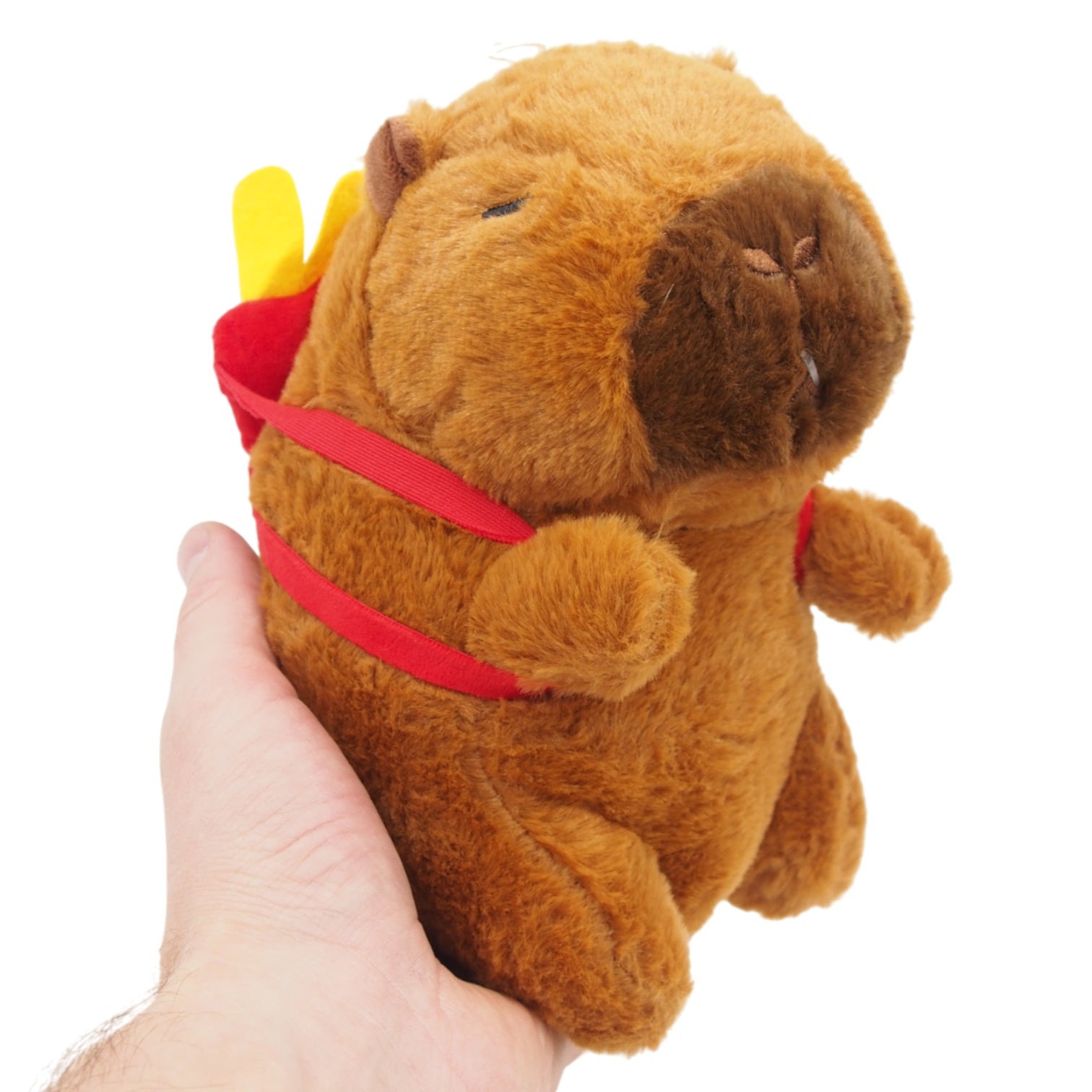 Minkštas pliušinis žaislas kapibara su bulvyčių kuprine